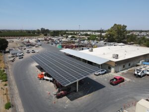 Commercial solar array under clear sky: Safe Harbor 2025, 10% deposit locks in solar tax credit before July 2026.”